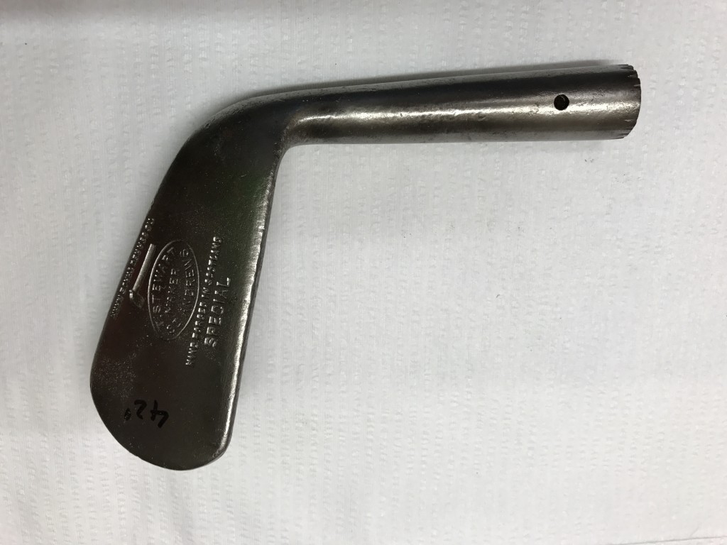Iron head showing the normal position of the pin